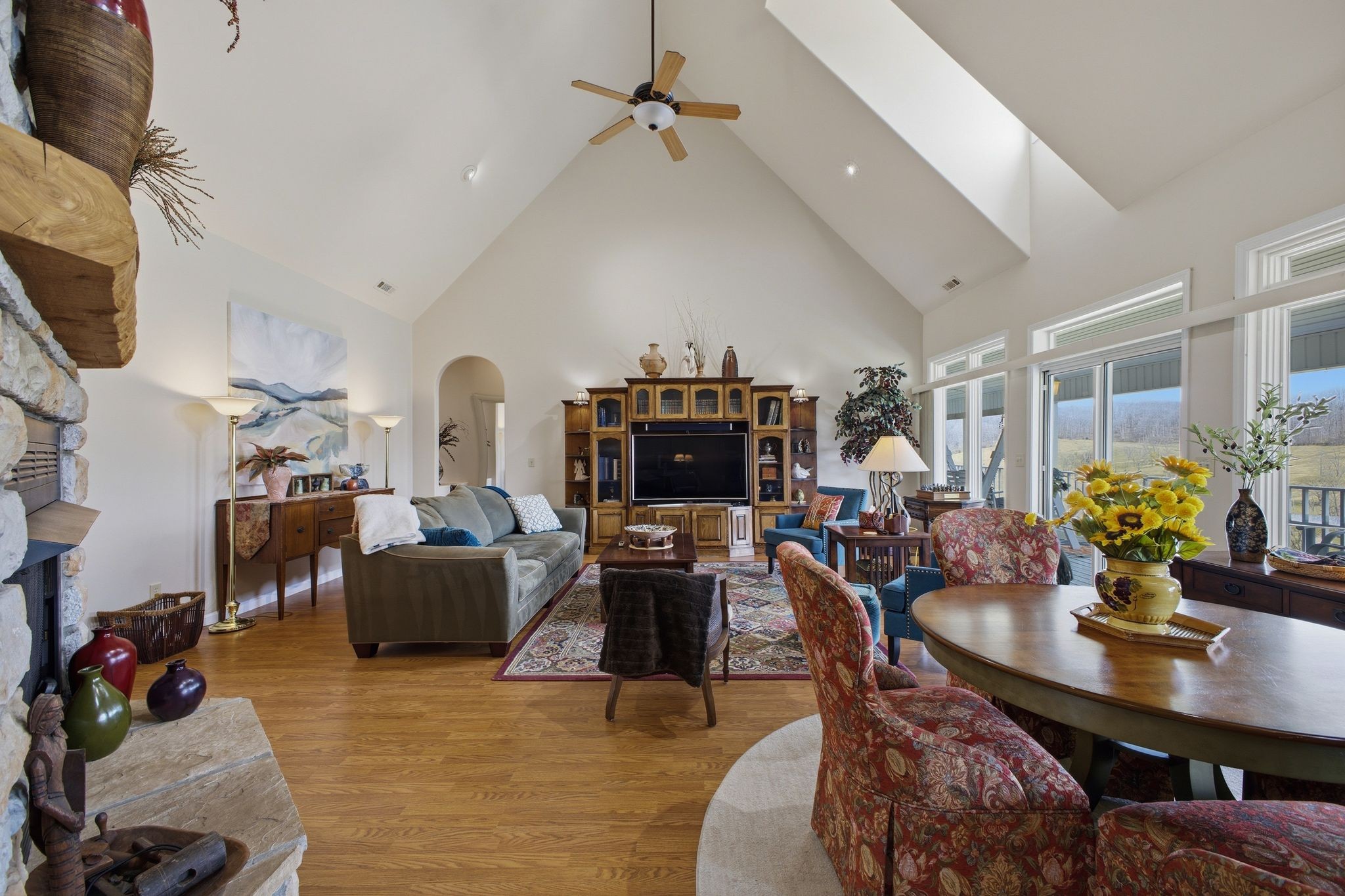 Great room with soaring ceilings and stone fireplace — 391 Keg Springs Rd
