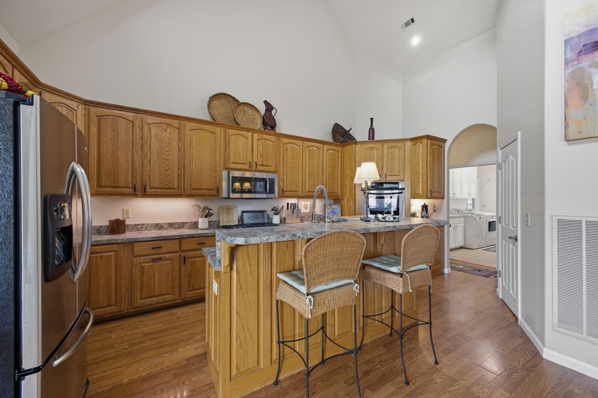 Kitchen with island and stainless appliances — 391 Keg Springs Rd