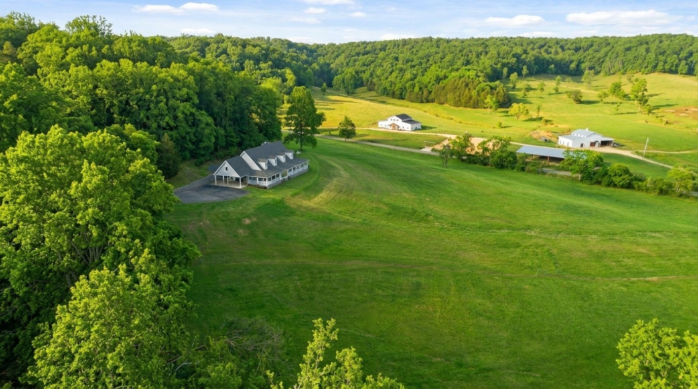 Aerial view showing home, shop, and 40 acres — Hampshire TN